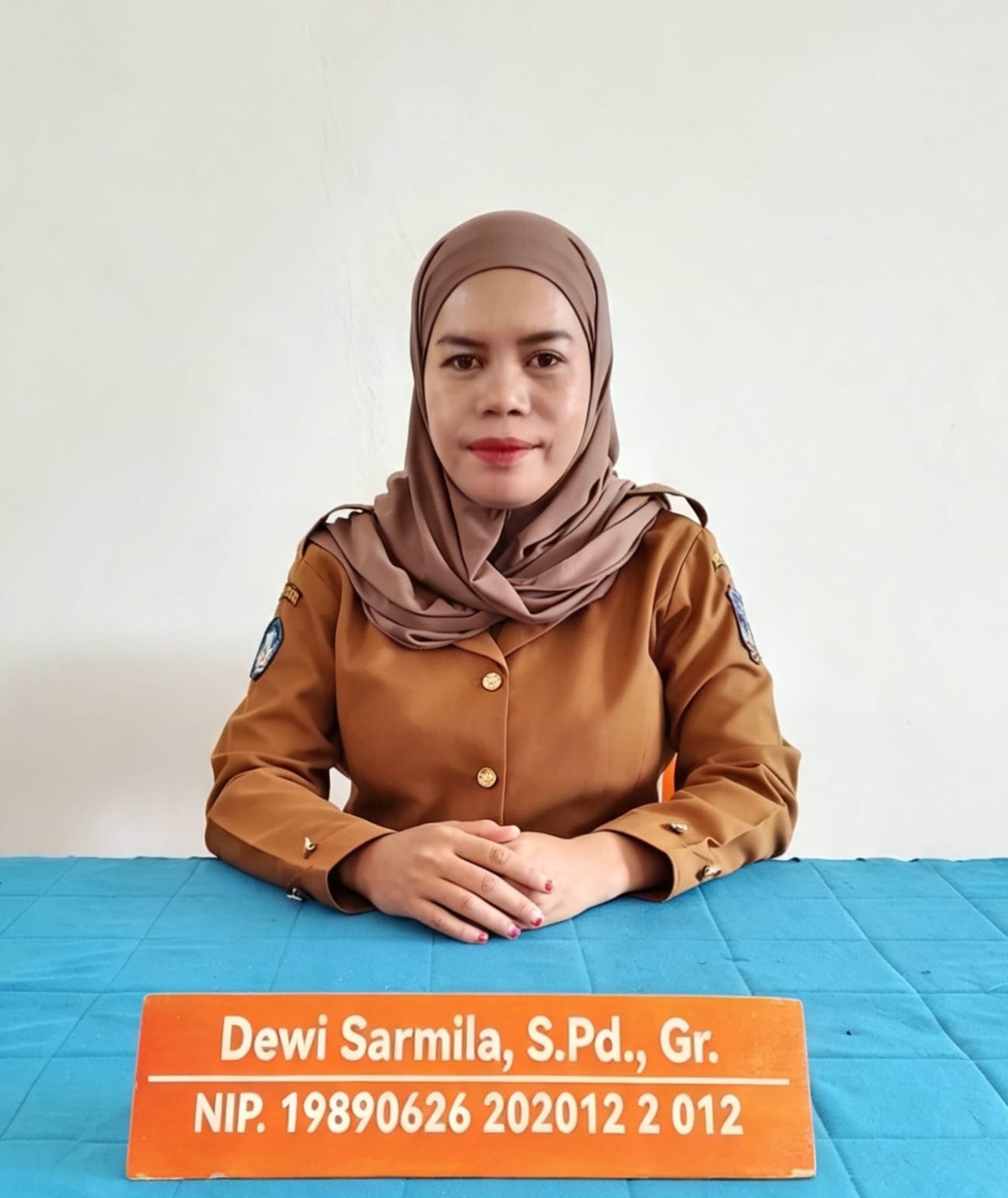 Dewi Sarmila, S.Pd., Gr.